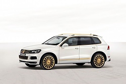 Нажмите на изображение для увеличения. 

Название:	3-Volkswagen-Touareg-Gold-Edition.jpg 
Просмотров:	190 
Размер:	44.0 Кб 
ID:	3593